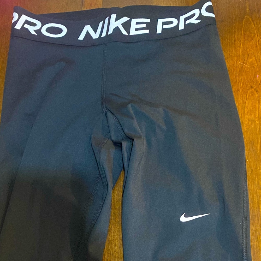 Nike pro leggings with mesh bottom